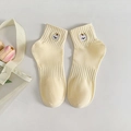 Pale yellow cotton socks with white cartoon cat embroidery in a soft knit finish - Yellow Dog (8002)