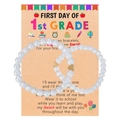 Detail of two crystal beaded bracelets with gold hearts on a back-to-school card - Clear