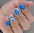 Detailed view of Klein blue and white seashell style press-on nails with wave patterns - Klein Blue Ocean Shell (CW666)