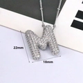 Silver letter M pendant necklace with sparkling cubic zirconia on a delicate chain - Letter M