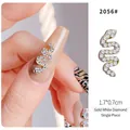 Macro detail of a 1.7x0.7cm gold snake nail art charm with sparkling white rhinestones - Gold White Zircon (2056#)