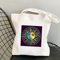 Canvas tote bag with sun and moon art print on a metal chair, bohemian aesthetic style - STD438-I (Purple Round Bottom Sun Moon)