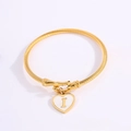 Golden titanium steel twist cable bracelet with heart pendant featuring letter I detail - Letter I