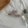 Detail of medium square tortoise shell hair claw clip with purple marble pattern on linen - Medium Square Claw / Phantom Purple