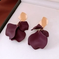 Detailed view of dark red matte acrylic flower earrings with golden metal accents - Gold-Dark Red