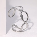 Bracciale rigido aperto minimalista in acciaio argento con design a maglie irregolari - Color Acciaio
