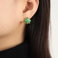 Elegant gold plated square stud earring with vintage green stone on a female model - Gold Green Stone Style (F1408)