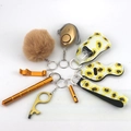 Flat lay of sunflower theme safety keychain set with gold alarm and plush pom pom - 7-Sunflower Gold