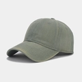 Close-up detail of grey-green cotton baseball cap showing twill texture and stitching - Grey Green