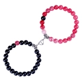 Magnetic couples bracelets with matte black and pink beads featuring a silver heart clasp - Heart Magnet / Black Red