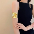Detailed close-up of a gold metal arm cuff featuring 3D floral accents on a model's arm - Gold 3D Floral Style (10#)