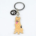 Detail of metal German Shepherd keychain with brown enamel and white paw print tag - German Shepherd + Paw