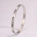 Silver-toned titanium steel bracelet featuring five rectangular cubic zirconia stones - Silver-White Zirconia