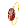 Detailed shot of handmade gold wire wrapped oval red agate stone tree of life bangle - KC Gold & Red Agate