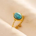 Close-up of adjustable gold 304 stainless steel ring featuring an oval turquoise stone - Adjustable Open / Gold Base-Light Blue Stone