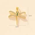 Detail of dragonfly pendant with gold plating, clear zircons, and green gems 3cm size - Style B