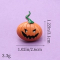 Macro detail of Halloween pumpkin resin charm showing dimensions 3.1cm height and weight 3.3g - Black Mouth Pumpkin
