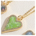 Golden heart pendant necklace with green mosaic inlay and sparkling zircon crystals - Green