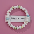 Ceramic bracelet with white bone beads and colorful beads on a pink background - White Bone Color Round (1586-04)