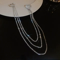 Detail of silver heart-shaped brooch with sparkling rhinestone fringe tassels - Silver Heart Tassel Style (31#)