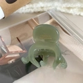 Handmade green resin spring hair clip with a translucent jelly finish and gold lettering - Octopus Claw: Green