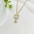 Golden necklace with a tiger pendant featuring a white opal stone and zircon accents - Cat's Eye Little Tiger