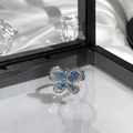 Detailed shot of a silver butterfly ring with blue enamel and pavé crystals on silk - Silver Blue Enamel Rhinestone Butterfly Style (14)
