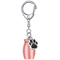 Pink metal cremation urn keychain with a silver dog paw print pendant and spring clasp - Rose Gold Urn Keychain 25*16mm