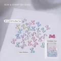 Pack de 30 dijes de resina aurora con forma de lazo en colores pastel para uñas - Estilo Pajarita (SP-1119) / Pack de 30