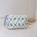 Detailed view of floral canvas coin purse with blue zipper and rose pattern - Dark Blue Bow Quilted Small Rose
