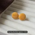 Ginger yellow velvet round ball stud earrings with a 1.7cm diameter on a white display box - Yellow