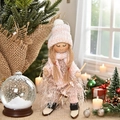Pink knitted Christmas ski doll ornament with fringe details and wooden skis - K-TS25 Pink Skiing Girl