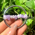 Close-up of a circular silver hair clip featuring natural purple crystal stones - Silver Circle Lavender Amethyst Chips