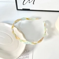 Minimalist twisted acetate headband with colorful marble texture and non-slip design - Orange Blue