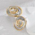 Minimalist oval spiral earrings in gold and silver tones with elegant textured finish - Gold & Silver Spiral Oval