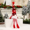 Detail of red snowflake knit hat gnome with light-up feature for Christmas decor - Long Leg With Light Red