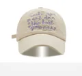 Detail of beige cotton baseball cap featuring purple embroidered motivational text - Adjustable / Off White