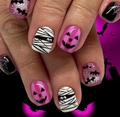 Macro detail of Halloween press-on nails featuring glitter bats, mummies and spider webs - Pink Purple Stripe Mummy Pumpkin Bat Style (CW366)