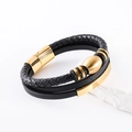 Détail du bracelet multicouche en cuir noir avec fermoir magnétique doré sur pierre blanche - Or (Une Perle) / Noir/Or