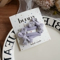 Pair of light purple floral fabric bow hair clips displayed on a bunny gift card - Purple Bow BB Clip