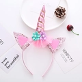 Pink unicorn headband featuring sequins, handmade flowers, and a metallic glitter horn - Pink Unicorn