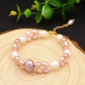 Baroque bracelet featuring natural pink and white freshwater pearls with gold lobster clasp - Large Pink Pearl Bracelet