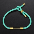 Detail of teal braided bracelet with adjustable gold sliding clasp and metal end caps - Teal