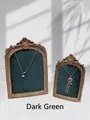 Detail of vintage gold carved frames with dark green velvet for jewelry necklace display - Dark Green