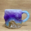 Artistic mug with purple-blue gradient and gold-brown embossed mineral texture - Purple Ore