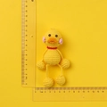 Handmade crochet yellow duck doll with size scale showing 13cm height and 6cm width - Dangling Leg Little Duck Doll