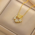 Golden butterfly donut pendant necklace with zircon crystals in a beige jewelry box - White Zirconia Donut Butterfly Necklace (859)