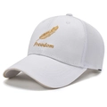 White baseball mesh cap with golden feather and Freedom embroidery in a 45-degree view - White