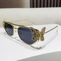 Occhiali da sole in metallo dorato con farfalla di strass e lenti grigio scuro - Grigio pieno