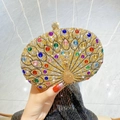 Golden peacock clutch bag with colorful crystals for weddings and vintage parties - Gold